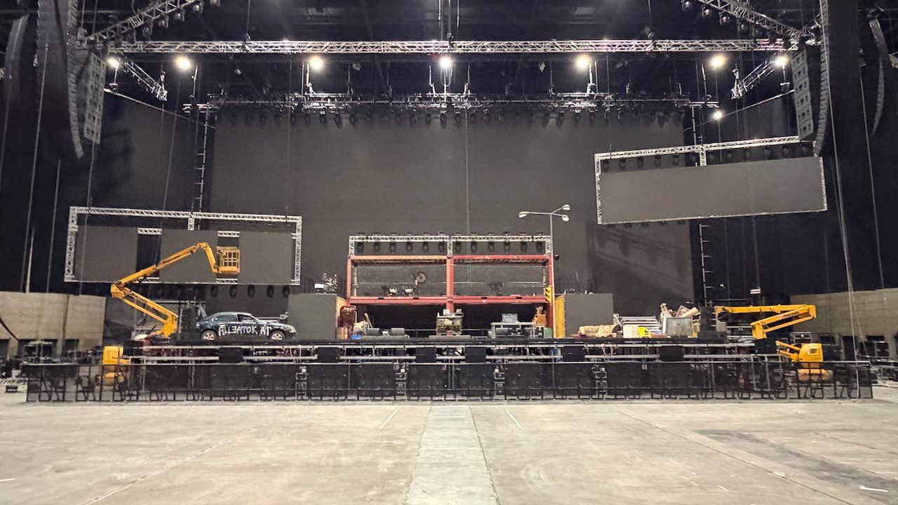 Arena stage build-up with lifts and video walls