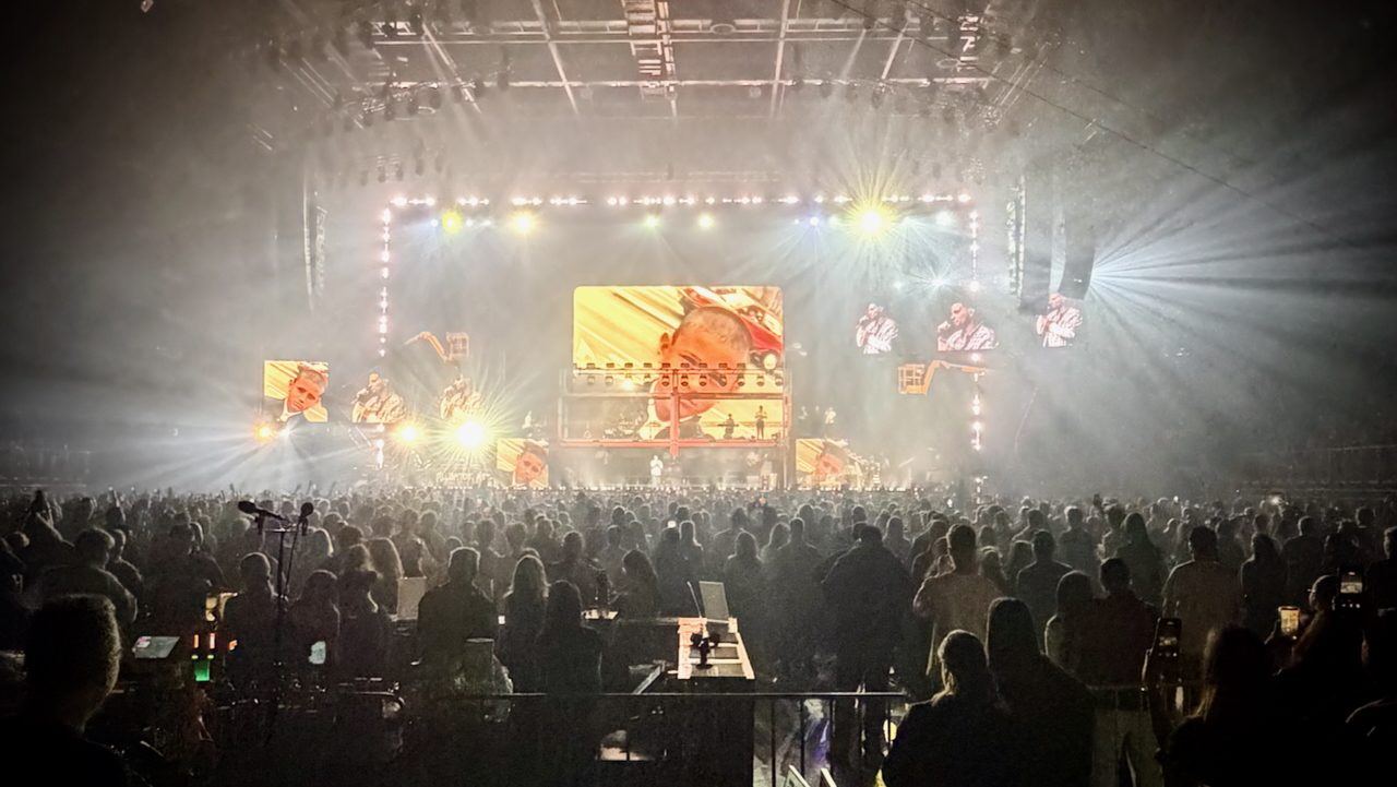 Arena show with large video screens